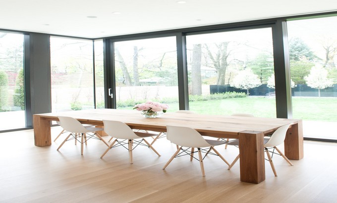 wood-table-white-eames-chairs.-love-table-chairs-or-family-friendly-kitchen-dining.-also-love-how-it-is-positioned-in-window-nook.