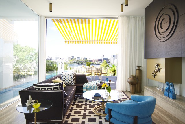 Elegant Contemporary Home Design Ideas by G Natale Love the pops of turquoise and yellow alongside the black and gold anchors in this living room