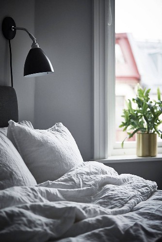 SCONCES TO A CONTEMPORARY HOME DESIGN Black and White Done Right in this Stockholm Apartment via Rue Magazine