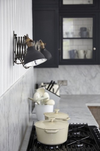 USE SCONCES TO A CONTEMPORARY HOME DESIGN kitchen design via remodelistaUSE BLACK SCONCES TO A CONTEMPORARY HOME DESIGN kitchen design via remodelista